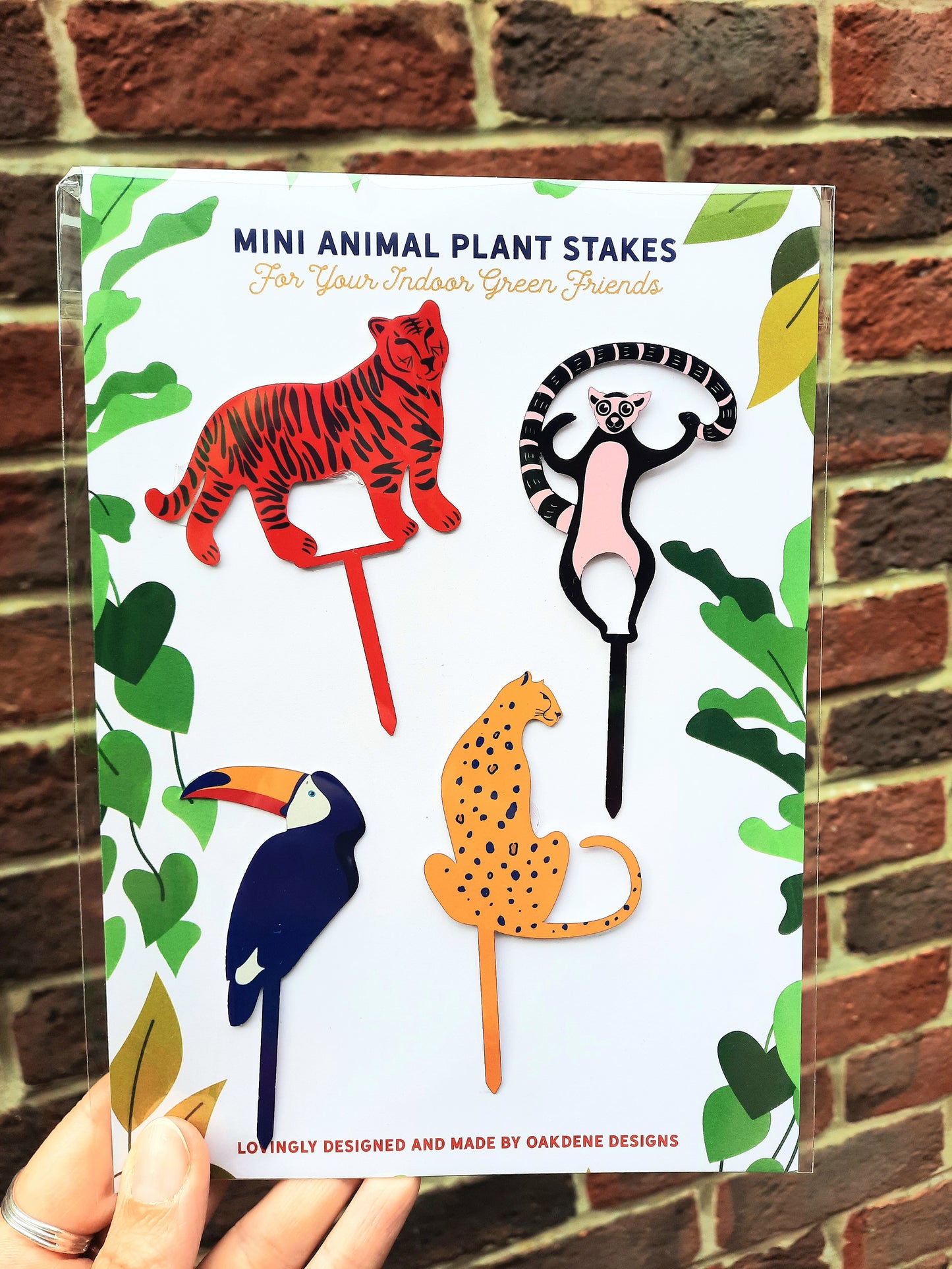 Set Of Four Mini Animal House Plant Stakes